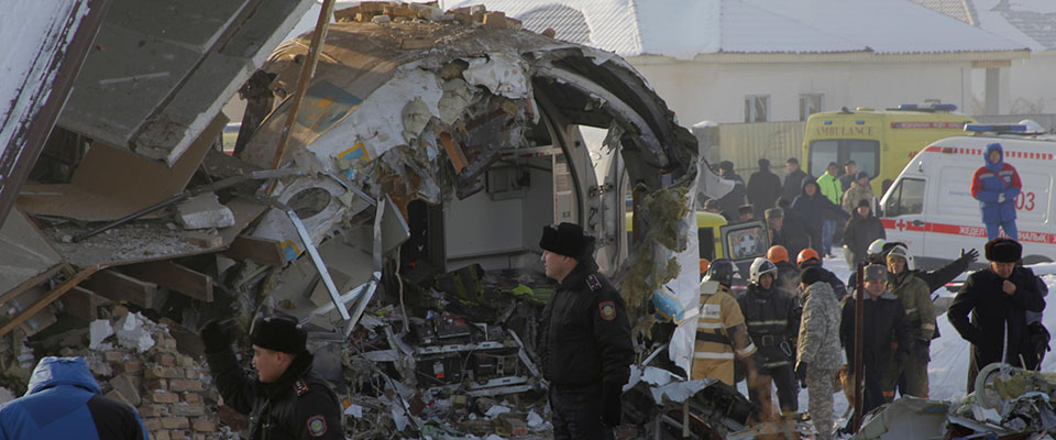 epa08091553 A handout photo made available by Almaty International Airport’ Press Service shows rescuers working at the site of an airplane crash near Almaty airport, some 20km from the city of Almaty, Kazakhstan, 27 December 2019. According to media reports, at least 14 people have died and over 60 were injured after a Bek Air’s Fokker 100 passenger plane with around 100 people on board crashed shortly after taking off from Almaty airport. The flight was en-route from Almaty, the country’s largest city, to the capital Nur-Sultan. The cause of the incident is yet unknown.  EPA/EDUARD GALEEV/PRESS SERVICE OF ALMATY INTERNATIONAL AIRPORT HAND HANDOUT EDITORIAL USE ONLY/NO SALES HANDOUT EDITORIAL USE ONLY/NO SALES