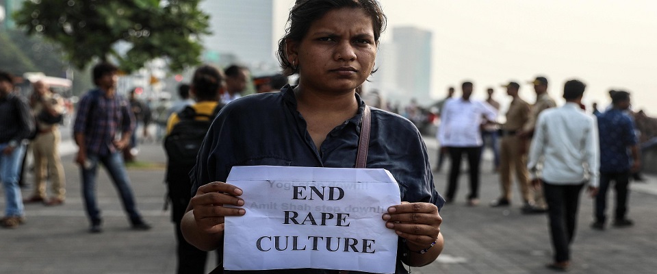 epa08054595 People along with activists hold placard as they take part in a protest over rising case of sexual violence and they demanded justice for victims and survivors of rape, in Mumbai, India, 08 December 2019. The protest comes after a young Indian woman died from her injuries in Lucknow after being set on fire while going to trial against her alleged rapist. On the same day, four men accused in the rape and murder of another young woman, were shot dead while in police custody in Bangalore.  EPA/DIVYAKANT SOLANKI