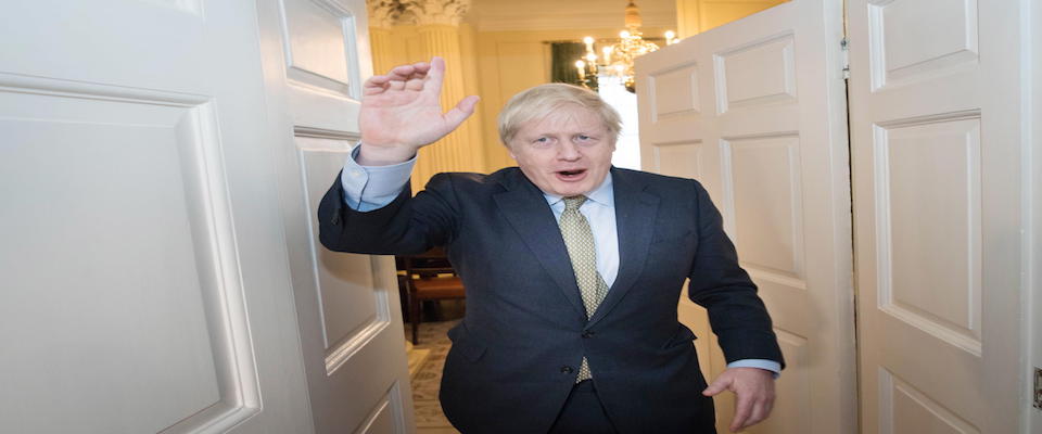 epa08068686 British Prime Minister Boris Johnson is greeted by staff as he arrives back at Downing Street from Buckingham Palace in London, Britain, 13 December 2019 after meeting with Queen Elizabeth II and accepting her invitation to form a Government, after the Conservative Party was returned to power in the General Election with an increased majority.  EPA/Stefan Rousseau / POOL