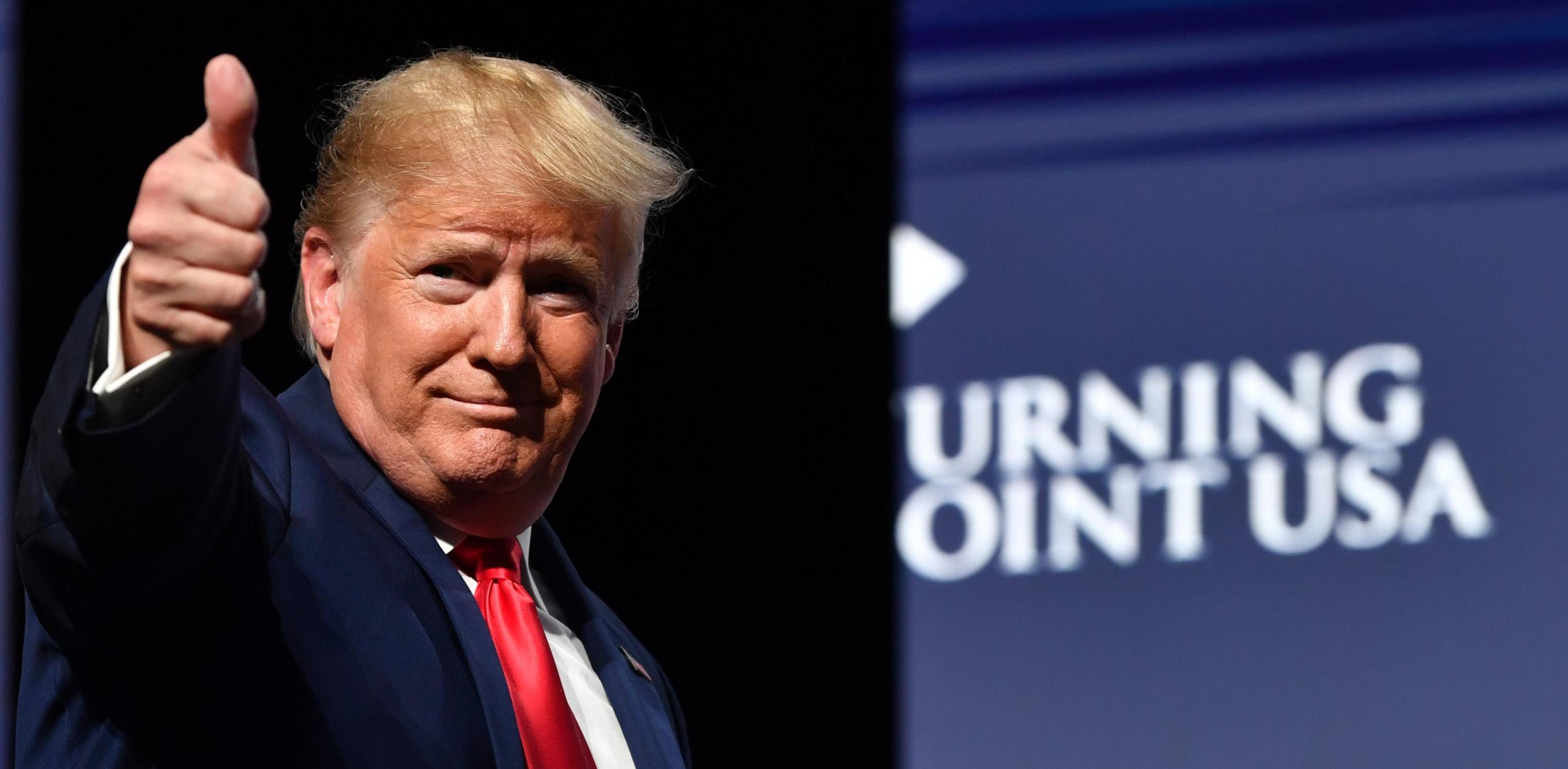 (FILES) In this file photo taken on December 21, 2019, US President Donald Trump arrives for the Turning Point USA Student Action Summit at the Palm Beach County Convention Center in West Palm Beach, Florida. – Trump’s re-election team on January 2, 2020, revealed that he sits atop a staggering campaign war chest, underlining the scale of the challenge facing the US president’s Democratic rivals at the start of an election year. In the fourth quarter of 2019, even as Trump was mired in a political scandal that resulted in his impeachment by the House of Representatives, he came out on top, raising a staggering $46 million. (Photo by Nicholas Kamm / AFP)