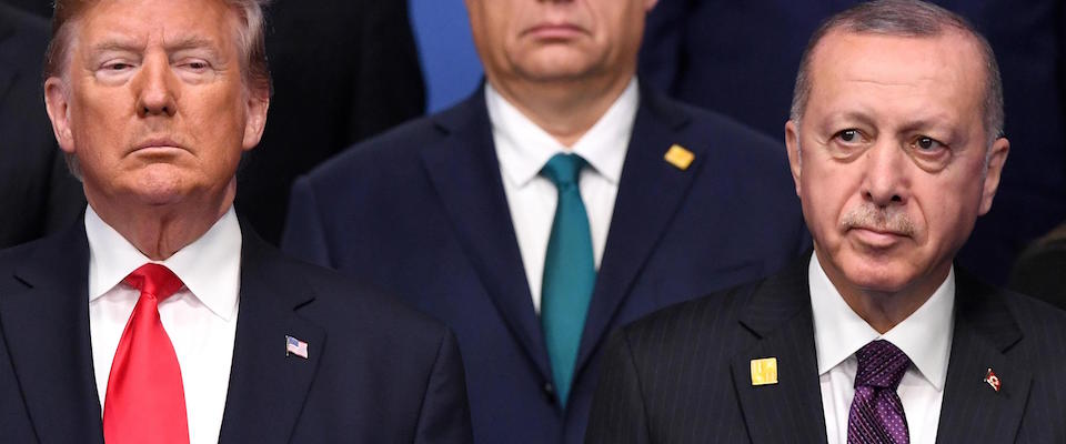 epa08043389 US President Donald Trump (L) and Turkish President Recep Tayyip Erdogan during the family photo at the NATO Summit in London, Britain, 04 December 2019. NATO countries’ heads of states and governments gather in London for a two-day meeting.  EPA/FACUNDO ARRIZABALAGA *** Local Caption *** 54486492