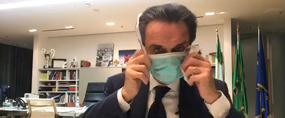 The Governor of Lombardy, Attilio Fontana, wears a protective mask in a video on Facebook as he announces the case of positivity to the Coronavirus of one of his collaborators, Milan, Italy, 26 February 2020. “From today something will change because I too will stick to the instructions given by the Higher Institute of Health, so for two weeks I will try to live in a kind of self-isolation that mainly preserves the people who work with me,” Fontana said.  ANSA / A frame taken from a Facebook live of  Governor of Lombardy, Attilio Fontana   ++NO SALES; NO ARCHIVE; EDITORIAL USE ONLY++