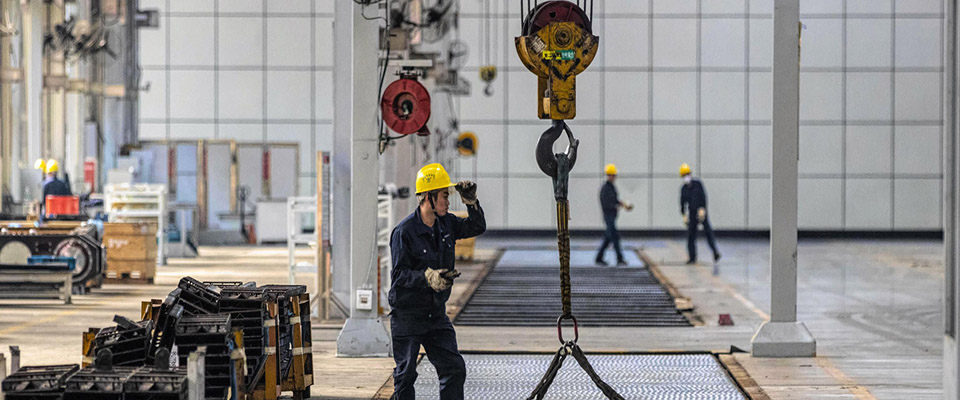 epa07961956 Employees work in the Sany Heavy Industry factory in Changsha, Hunan province, China, 19 October 2019 (issued 31 October 2019). China’s manufacturing purchasing managers’ index (PMI) foaled for sixth month in a row, according to official data released on 31 October. The ongoing contraction illustrates a worsening business climate, despite Beijing’s efforts to spark economic growth. Media reports state that the October PMI was below expectations at 49.3 points from September at 49.8 and the lowest since hitting the 49.2 in February 2019.  EPA/ALEX PLAVEVSKI  ATTENTION: This Image is part of a PHOTO SET