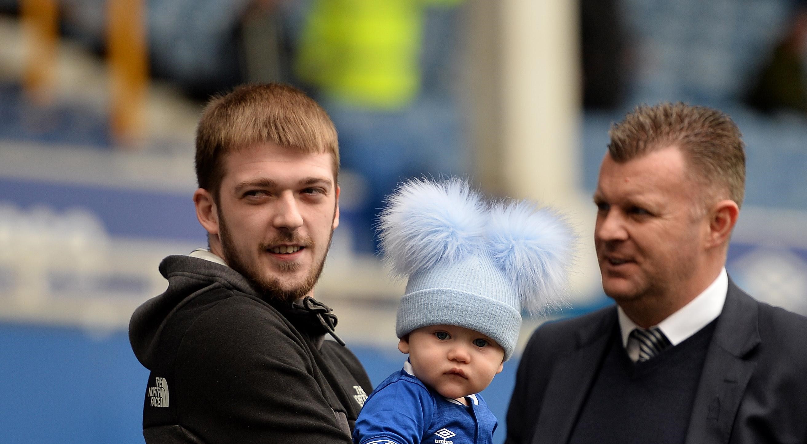 epa07490167 Tom Evans father of Alfie Evans holding his son Thomas at pitch side before the English Premier League soccer match between Everton and Arsenal held at Goodison Park in Liverpool, Britain, 07 April 2019. The Alfie Evans case was a legal case in 2018 involving Alfie Evans, an infant boy from Liverpool with an undiagnosed neurodegenerative disorder, later revealed to be GABA-transaminase deficiency  EPA/PETER POWELL EDITORIAL USE ONLY. No use with unauthorized audio, video, data, fixture lists, club/league logos or ‘live’ services. Online in-match use limited to 120 images, no video emulation. No use in betting, games or single club/league/player publications