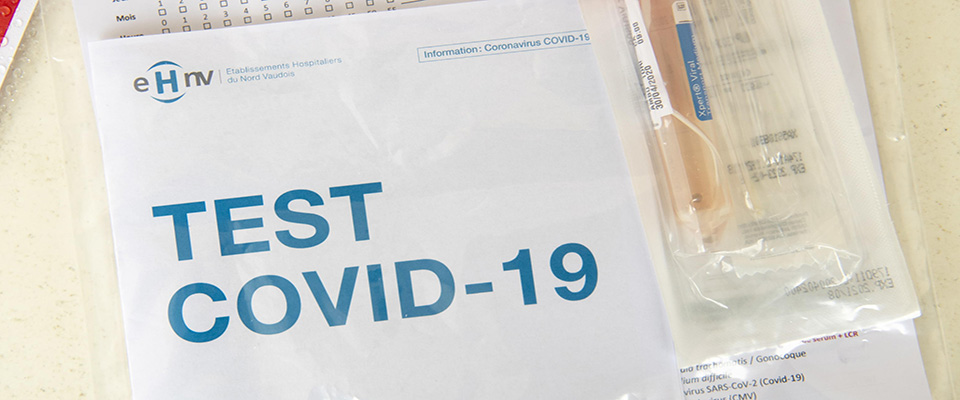 epa08392909 A Covid-19 test is waiting to go to the laboratory after a medical worker took a swab at a drive-in coronavirus testing facility in front of the eHnv hospital (Etablissements Hospitaliers du Nord Vaudois) during the state of emergency of the coronavirus disease (COVID-19) outbreak, in Yverdon-les-Bains, Switzerland, 30 April 2020. Countries around the world are taking increased measures to stem the widespread of the SARS-CoV-2 coronavirus which causes the Covid-19 disease.  EPA/LAURENT GILLIERON