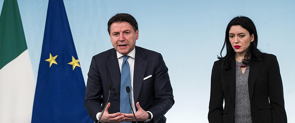 Italian Prime Minister Giuseppe Conte (L) with Italian Education Minister Lucia Azzolina (R) during a press conference about Italy’s coronavirus emergency situation at Chigi palace, Rome, 04 March 2020. The government has decided to close schools and universities until mid-March to reduce the risk of contagion of the coronavirus.  ANSA/ANGELO CARCONI