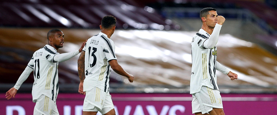 Cristiano Ronaldo of Juventus celebrates after scoring 2-2 goal during the italian Serie A soccer match between AS Roma and FC Juventus at Olimpico Stadium in Rome, Italy, 26 Semptember 2020. ANSA/FEDERICO PROIETTI