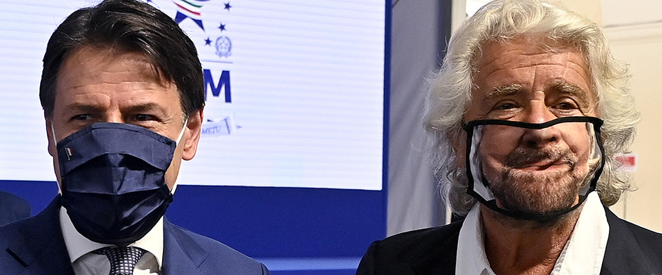 Beppe Grillo (R) with prime minister Giuseppe Conte (L) during the presentation of the 2019 Blue Book at the Customs and Monopolies Agency, Rome, Italy, 11 September 2020. ANSA/RICCARDO ANTIMIANI