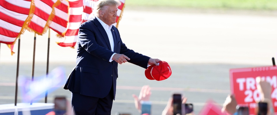 epa10543613 Former US President Donald Trump points to the crowd during his Make America Great Again Rally at the Waco Regional Airport Center in Waco, Texas, USA, 25 March 2023. This is the first stop of Trump’s election campaign tour for presidency in 2024.  EPA/ADAM DAVIS