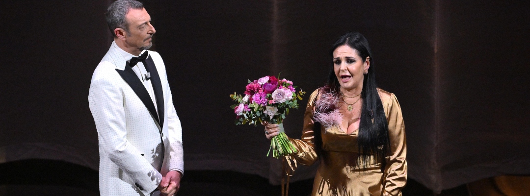 Sanremo Festival host and artistic director Amadeus (L) with Daniela Cutolo, mather of Italian musician Giovanbattista Cutolo, alias Giogiò on stage at the Ariston theatre during the 74th Sanremo Italian Song Festival, in Sanremo, Italy, 06 February 2024. The music festival will run from 06 to 10 February 2024.  ANSA/ETTORE FERRARI