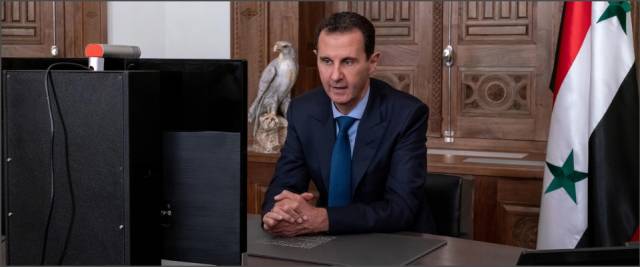 Assad riappare